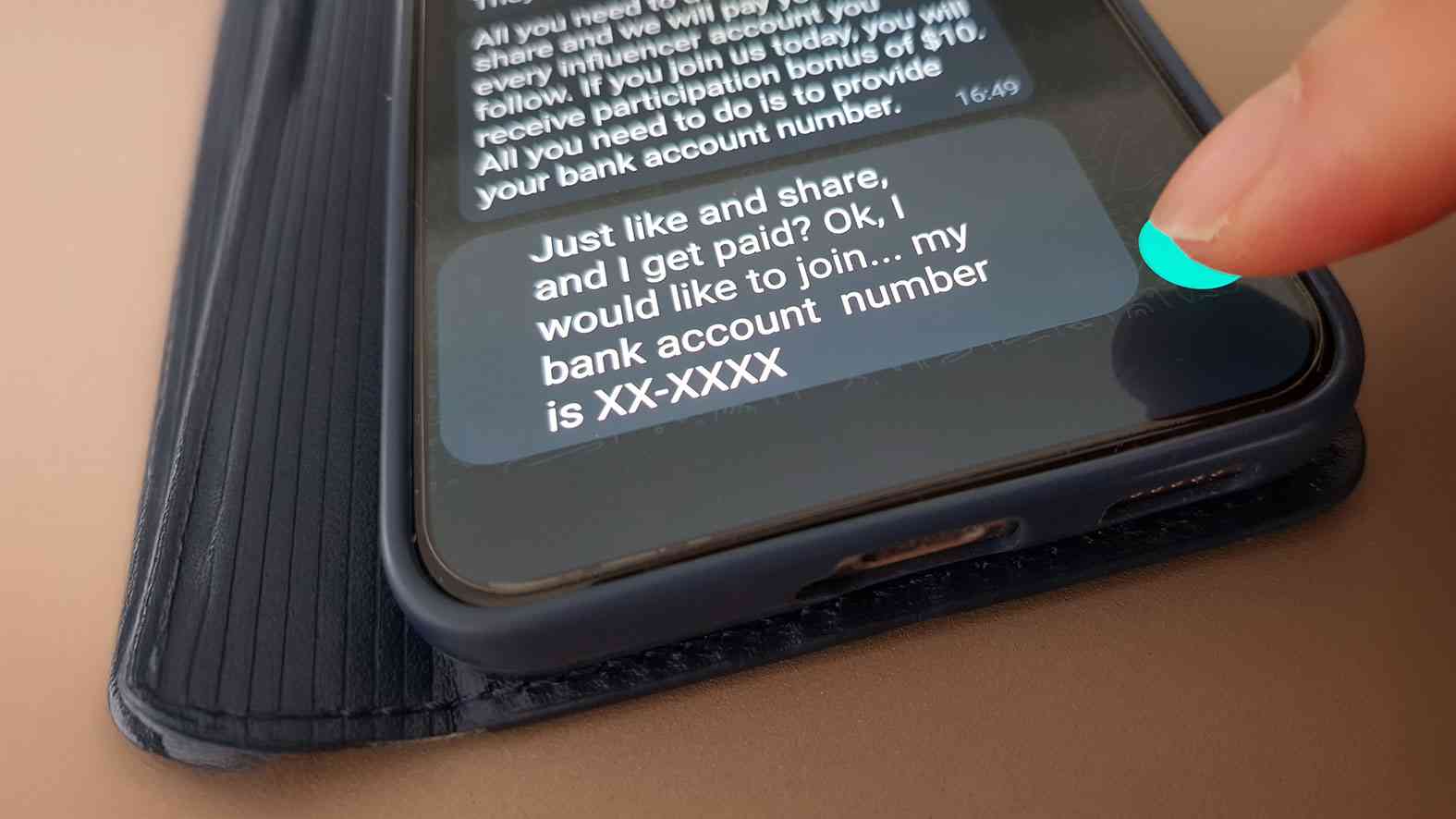 Mobile phone showing fake recruiter scam in SMS
